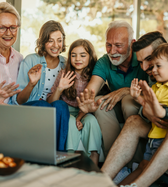 grandparents and kids waving bye to computer meeting