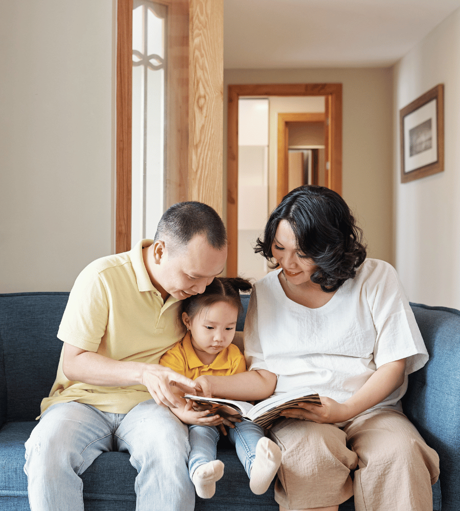parents-reading-to-child